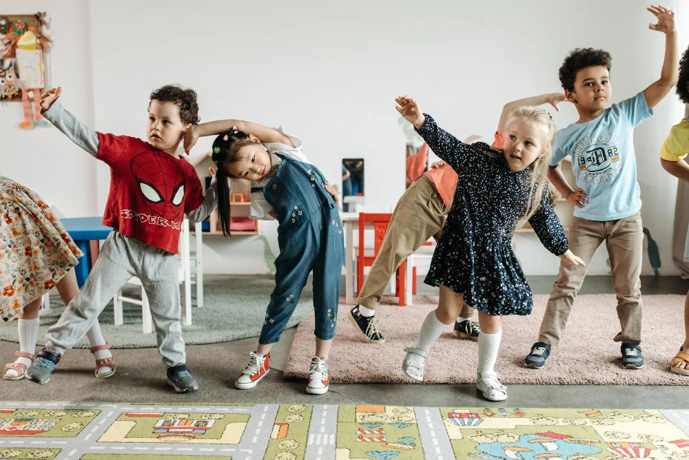 group of children playing freeze dance